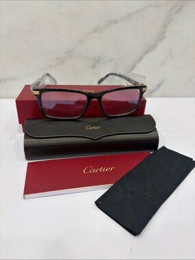 Cartier Black Frame Sunglasses with Pink Lenses and Gold Accents